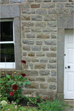 quarried dimension stone regularly coursed, hammered face c.1820s