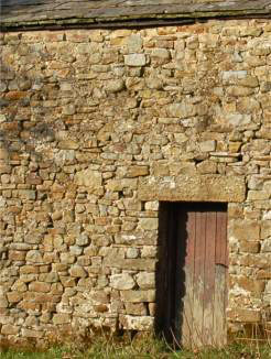 Outbarn with river and some quarried stone, including lintel, Lowgill